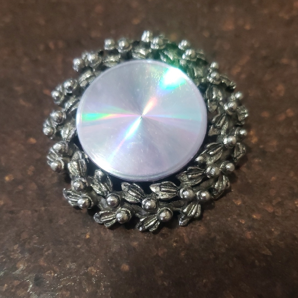 Vintage Jewelarama Silver Brooch with Iridescent Center.